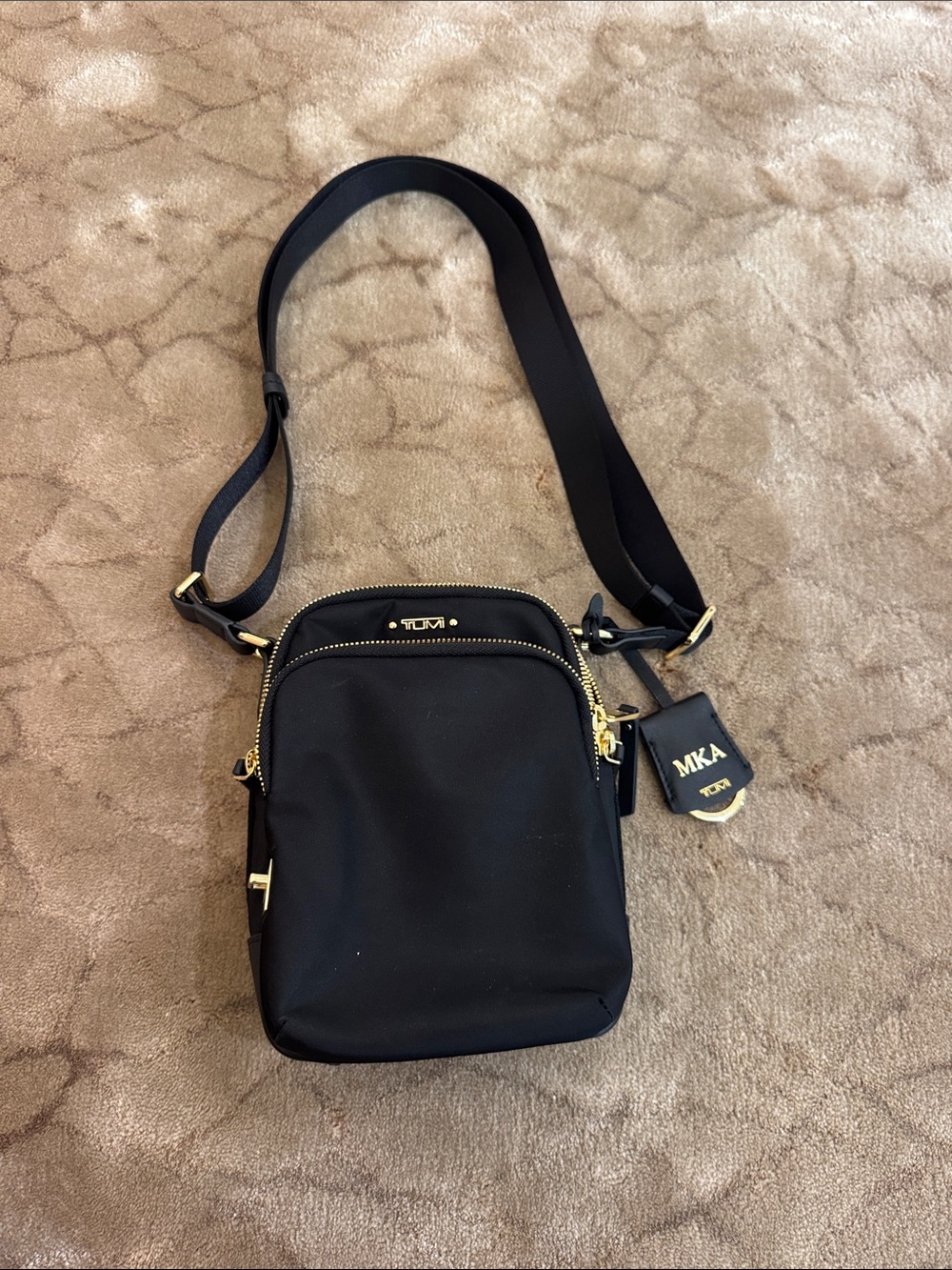 Tumi Black Crossbody Belt Bag with Gold Hardware